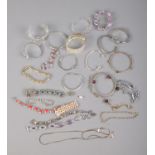 A quantity of costume jewellery to include gold plated necklace, bangles and bracelets.