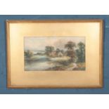 Alfred Coleman, Australian 1890 - 1952. Gilt framed watercolour depicting cottage by river.