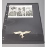 A German Luftwaffe WWII pilot badge together with a signed pilot photograph.