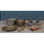 A good collection of metalwares, to include two jam pans, stork ornaments and goblets.