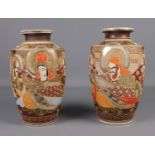 A large pair of Japanese satsuma vases sharing immortals and goddess decoration. Height 32cm