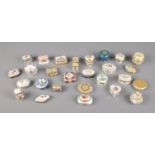 A collection of mostly DelPrado trinket boxes of various shapes and sizes.