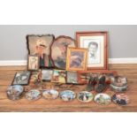 A large collection of John Wayne memorabilia to including assorted pictures, cabinet plates, rifle