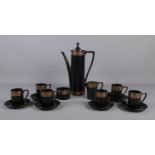 A Portmerion 'Greek Key' coffee service, designed by Susan Williams-Ellis. Comprising of six cups