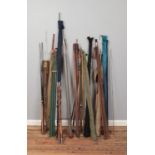 A good collection of fishing rods including both vintage and modern examples.