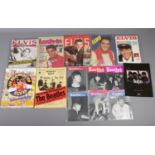 A collection of The Beatles and Elvis books and magazines. Includes The Beatles Monthly,