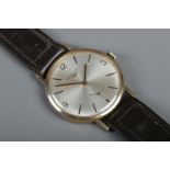 A Gents 9ct Gold Longines manual wristwatch, with quarterly numeral and baton markers, with