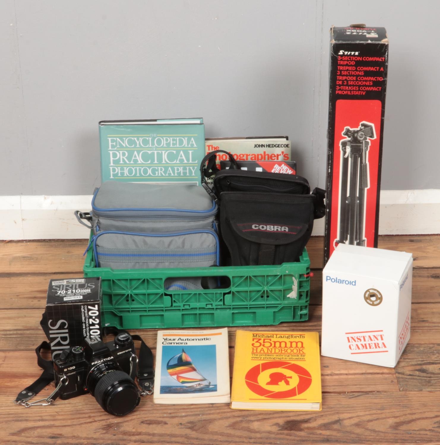 A quantity of camera equipment, to include Pracktica B100 camera in case, boxed Polaroid Spirit