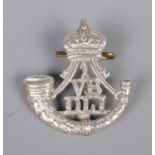 A 1st Volunteer Battalion Durham Light Infantry silver cap badge.