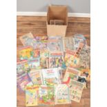 A box of comics. Includes 1970s Walt Disney Mickey Mouse, Commando, Tornado, Champ, etc.