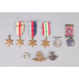 A collection of medals including the Italy star medal, the Africa star medal, a pair of the 1939 -