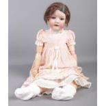 A vintage Heubach Koppelsdorf 302.3 doll. Stamped to the back of the head.