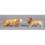 Two Beswick figures formed as leopard and lion.