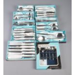 A collection of boxed Wostenholm Monte Carlo and Oneida stainless steel flatware to include table