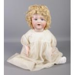 An Armand Marseille 996 mould doll, 'Baby Doll'. Stamped '996, 2' to the back of the neck. Little