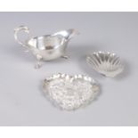 A collection of silver to include sauce boat and two bon bon trays. Hallmarks various, total