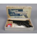 The Webley "Mark I" 0.22cal air pistol, with chequered grip and in original box, with leaflet.