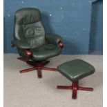 A stressless swivel armchair and footstool in green leather