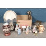 A box of miscellaneous. Includes Giuseppe Armani figural table lamp, decorative oriental vase on