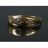 A Victorian 18ct gold three stone gypsy ring. Size P. 3.26g. Tested.