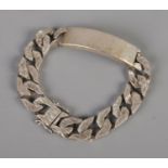 A heavy silver link bracelet hallmarked London 1976. 91.52g.