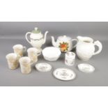 A quantity of mixed Wedgwood ceramics including teapots, coffee mugs, pitchers and more