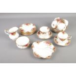 A Royal Albert Old Country Roses tea set including six tea cups and saucers, sugar bowl, milk jug