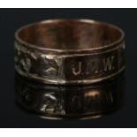 An antique 9ct Gold leaf scroll band, with initials JMW to outer and 'Mary' to the interior of the