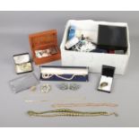 A box of assorted costume jewellery including necklaces, earrings, rings, etc.