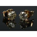 A pair of 18ct gold and diamond stud earrings. Assayed for Sheffield and bearing makers mark for