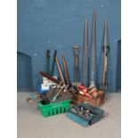 A large quantity of tools including gardening equipment, electrical jigsaw, planes, saws, hammers