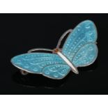 A vintage sterling silver and blue enamel butterfly brooch. Stamped Sterling, Thailand to reverse.