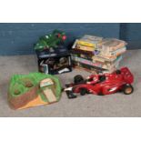 A collection of children's toys and games to include Dad's Army board game, Thunderbirds, jigsaw