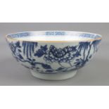 An 18th century Chinese export bowl decorated in underglaze blue. Diameter 20cm. Two cracks, one