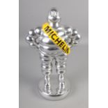 A Michelin Man chrome plated advertising figure. Height 35cm