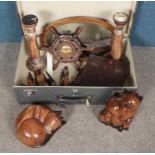 A Globetrotter suitcase with contents of assorted woodenware. Including large candlesticks, cat