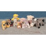 A collection of soft toys, to include Disney Winnie the Pooh and pull-along Chiltern Toys Donkey.