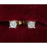 A pair of 9ct gold diamond stud earrings. Diamonds approximately 0.06ct each.