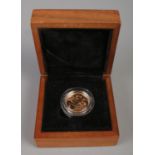 An Elizabeth II 2015 proof sovereign, in Royal Mint box. 7.9g