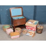 A quantity of sewing and crochet equipment. Including Arnold oak sewing box, baskets, etc.