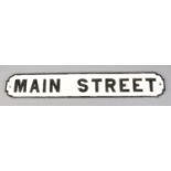 A painted cast iron street sign; 'Main Street'. 84cm.