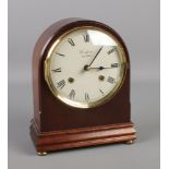 A dome shape mahogany Woodford 8 day mantel clock. (22cm)