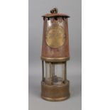 An Eccles Type SL Safety Lamp, by The Protector Lamp and Lighting Co Ltd. Stamped for marker '6'.