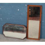 Two oak framed mirrors. Includes carved octagonal bevel edge example, etc.