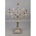 An ornate metal five branch candelabra. With chicken head decoration. (51cm)