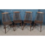 A set of four Ercol style stained ash/elm dining chairs.