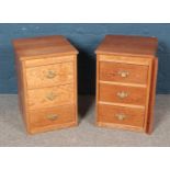 A pair of pine bedside tables with brass geogian style handles. Height 61cm Width 41cm Depth 43cm