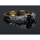 A mid twentieth century 18ct Gold and Platinum Sapphire and Diamond ring. Size NÂ½. Total weight: