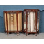 Two vintage display cabinets.