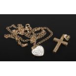 A small collection of 9ct gold jewellery. Includes 9ct crucifix pendant along with a 9ct gold and